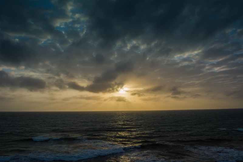 Cloudy Sunrise Over The Ocean