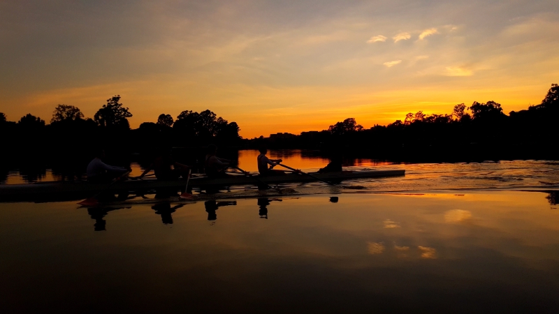 Rowers going for a row at sunrise