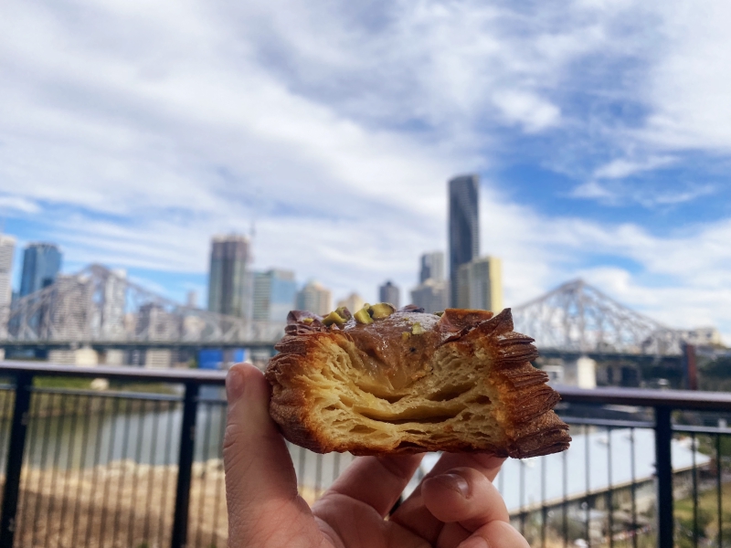 Pastry from Agnes Restaurant pop-up bakery during Brisbane lockdown with the Story Bridge in the background. Brisbane, Queensland, Australia. 7 August 2021